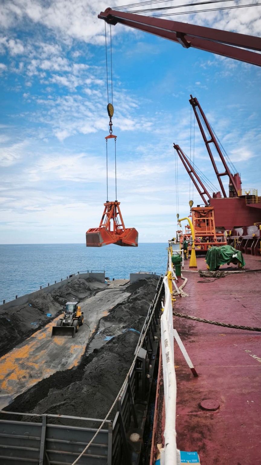 Original RPM operation: grab crane above cargo barge
